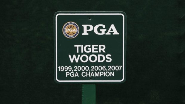 The vacant parking spot of Tiger Woods is seen near the clubhouse.
