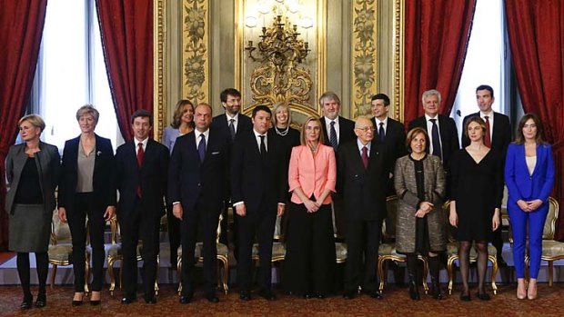 Sworn in: Newly appointed Italian Prime Minister Matteo Renzi (front row, 5th left) poses with his new ministers.