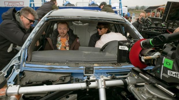 Director Christopher McQuarrie, Simon Pegg and Tom Cruise on the set of <i>Mission: Impossible - Rogue Nation</i>.
