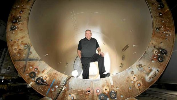 Keppel Prince CEO Steve Garner in front of unused turbine.