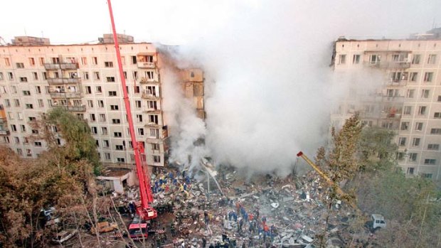 Smokescreen ... the scene after a massive explosion shattered a nine-storey apartment block in Moscow in 1999.