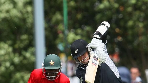 Nathan McCullum forces a ball into the covers.