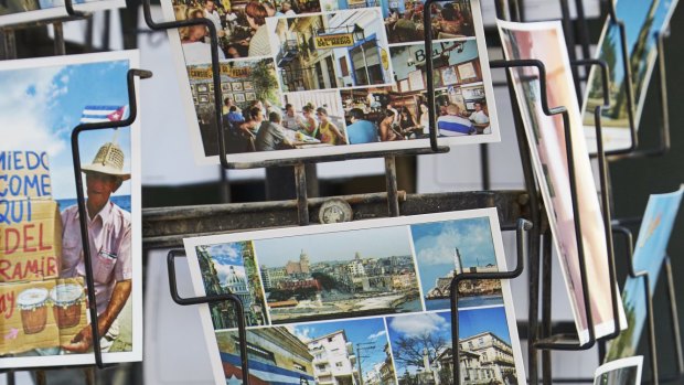 Souvenir postcards on display in Habana Vieja. 