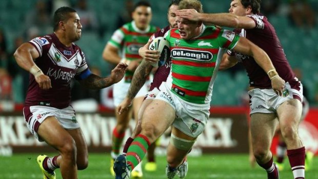 Rabbit on the run: George Burgess charges up the middle.
