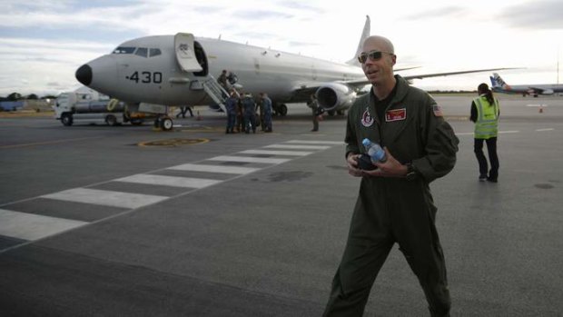 Flight Commander David Mims returns after searching for MH370.