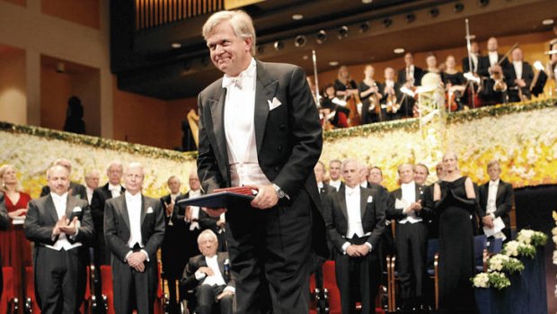 Recognition … Schmidt accepts the 2011 physics prize at the Nobel award ceremony in Stockholm.