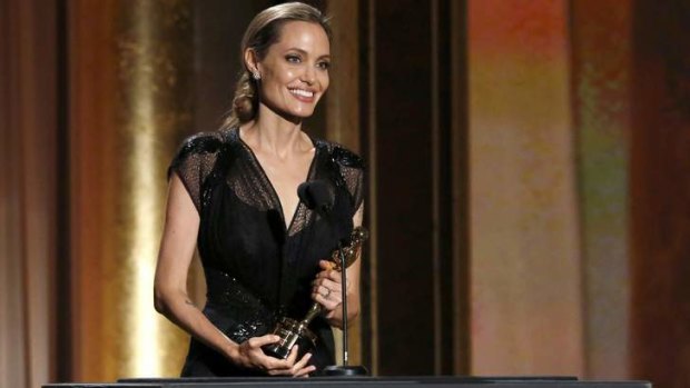 Angelina Jolie accepts the Jean Hersholt Humanitarian Award at the 5th Annual Academy of Motion Picture Arts and Sciences Governors Awards.