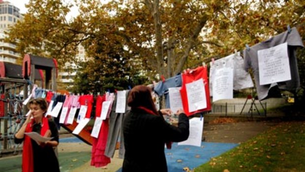 The names of 22 children killed by their fathers on access visits hung from a makeshift clothesline in a city park yesterday.