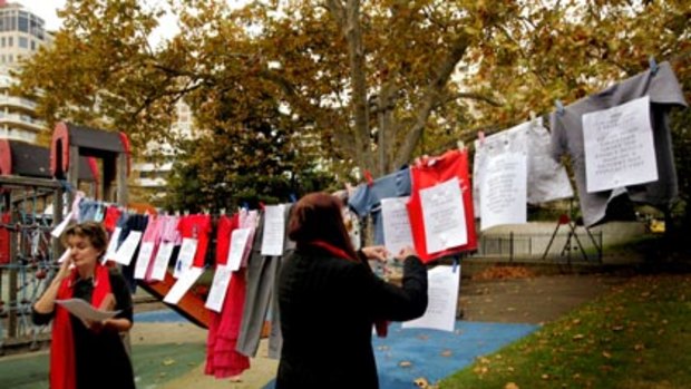 The names of 22 children killed by their fathers on access visits hung from a makeshift clothesline in a city park yesterday.