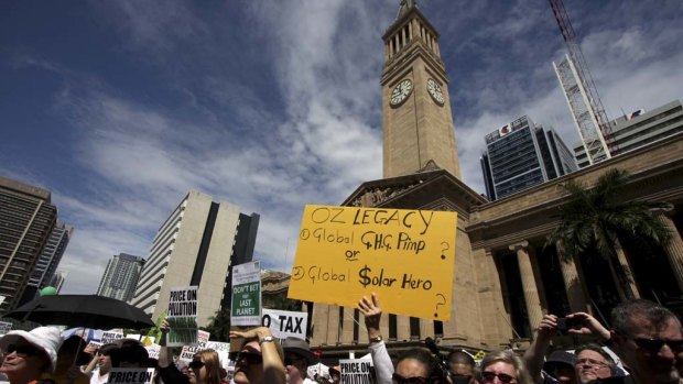 Call for action ... protesters  gather at King George Square in Brisbane yesterday in support of action to combat climate change.