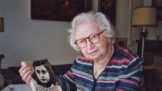 Miep Gies … with a copy of her book about Anne.