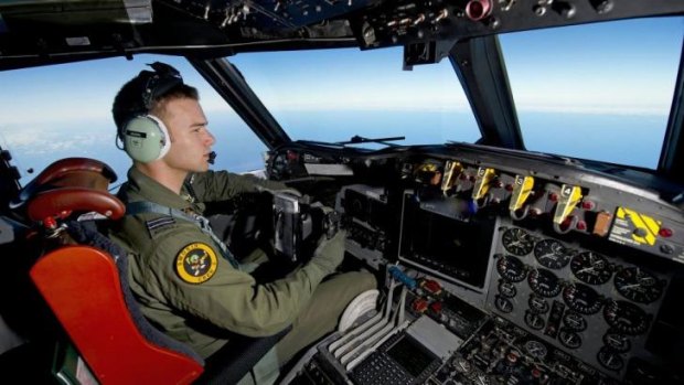 The search for Flight MH370  continues ... RAAF pilot Flight Lieutenant Russell Adams flies his AP-3C Orion over the Southern Indian Ocean.