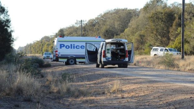 Farmer charged with murder: Police arrive at the scene of the crime outside Moree.