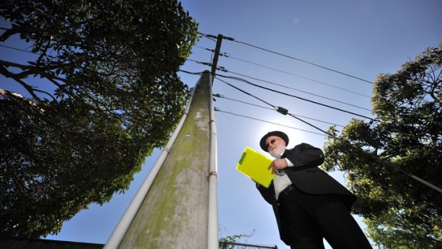 Peter Kloot checks that the Melbourne eruv is intact.