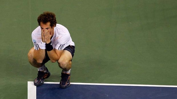 Finally: Andy Murray after winning a marathon final against Novak Djokovic.