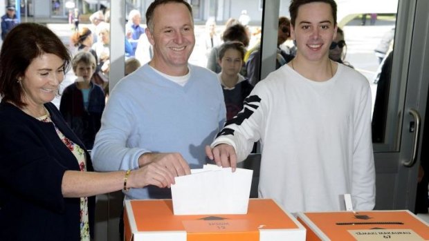 New Zealand Prime Minister John Key and his family vote in the general election.