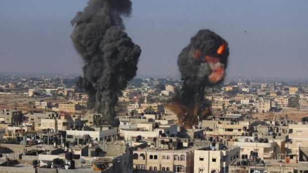 Smoke and flames following what police said was an Israeli air strike in the southern Gaza Strip.