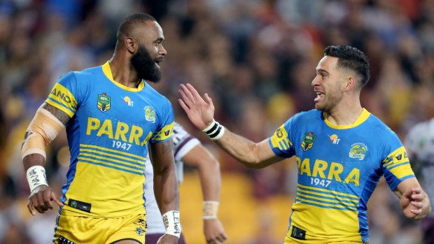 Unstoppable: Semi Radradra and Corey Norman celebrate another try to the winger.