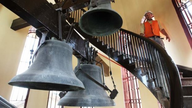 All along the clock tower: The bronze bells of the Town Hall clock are finally able to ring the changes again.