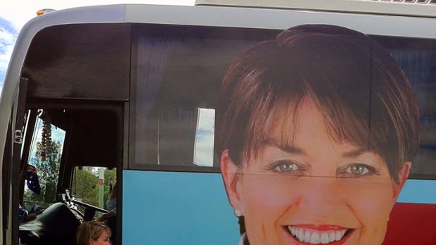 Premier Anna Bligh boards the bus on her final day of campaigning.