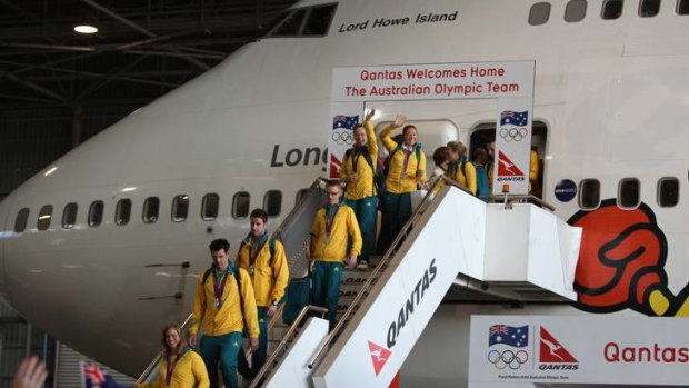 Back home ... Australian Olympic athletes return home.
