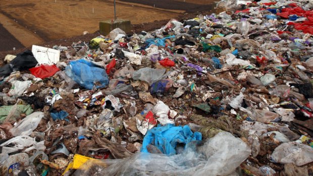 It's now significantly cheaper to put rubbish into landfill in Queensland than in New South Wales or Victoria after the Newman government scrapped the waste levy.