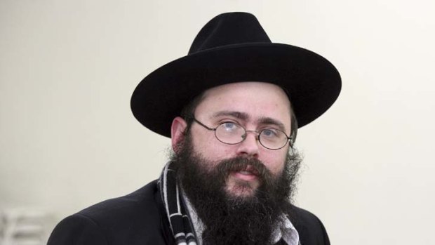 Rabbi Yosef Feldman ... email saying sex abuse allegations should be handled within the Jewish community was not his ''official position''.