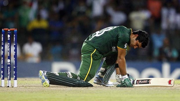 Pakistan batsman Umar Akmal was fined 50 per cent of his match fee for an "offensive" snub of the umpires' authority during his team's defeat to Sri Lanka in the World Twenty semi-finals.