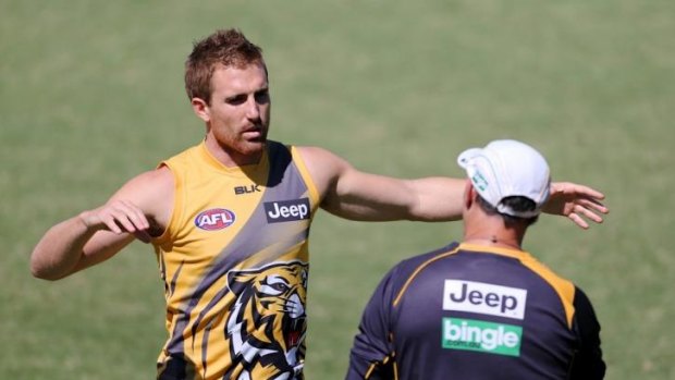 Tiger in waiting: Richmond’s Daniel Jackson receives instructions at training on Tuesday. 