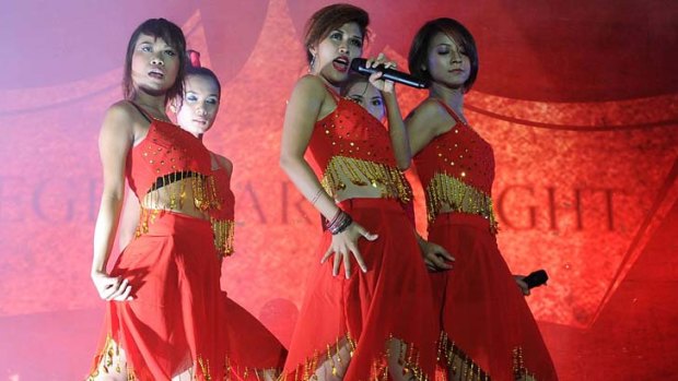 Members of the Me N Ma Girls band perform in Rangoon.