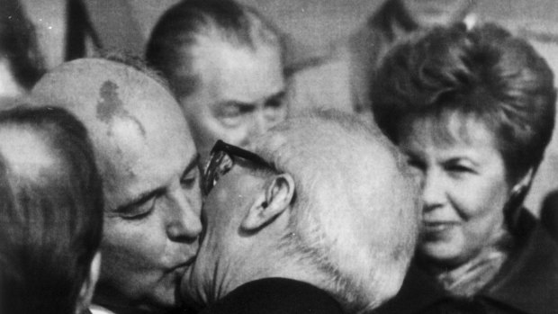 Mikhail Gorbachev and Erich Honecker greet each other in East Berlin in 1989.