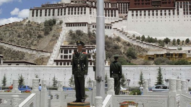 Paramilitary policemen guard the Potala Palace in Lhasa, Tibet. The June visit by US Ambassador Gary Locke was used as an "opportunity" to replace them with uniformed police.