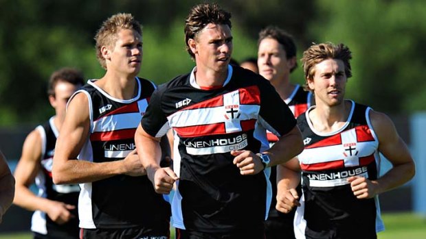 Ready to fight: Justin Koschitzke (above) and Nick Winmar (below) are in the St Kilda squad for tomorrow's game.