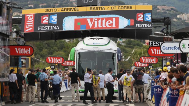 'I saw that it was a bit low, but they said, 'Avance, avance!'': The Orica-Greenedge team bus collides with the finishing banner at the end of stage one.