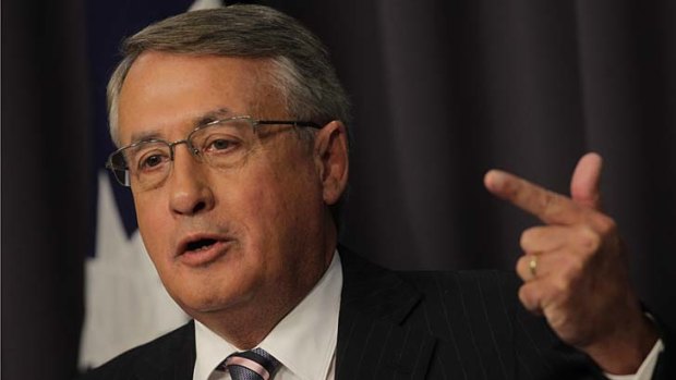 "What we've seen in this quarter has been a pretty savage reduction in our terms of trade" ... Treasurer Wayne Swan.