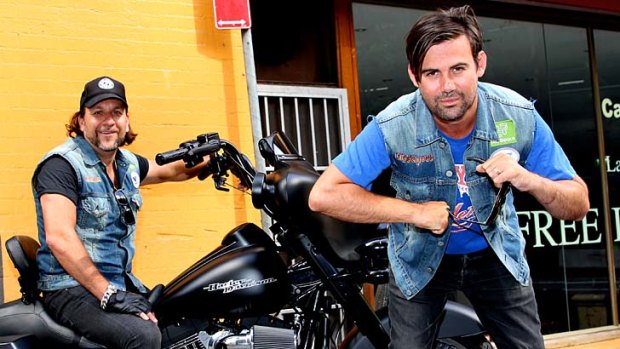 Phil Jamieson, pictured right with Big Day Out chief executive Adam Zammit,  looks quintessentially rock’n’roll. He sports dark sunglasses, chipped black nail polish and a cut-off denim vest.