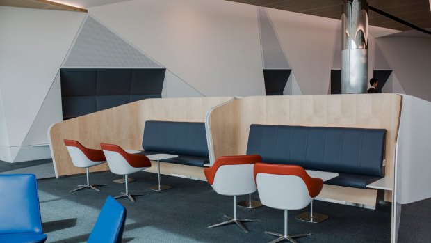 Leather seats and wooden booths are featured in Canberra's new international terminal.