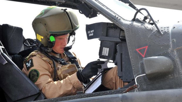 Prince Harry as he prepares his Apache helicopter in El Centro, California.