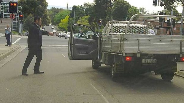 Deadly confrontation ... the moment police engaged the man in the ute.