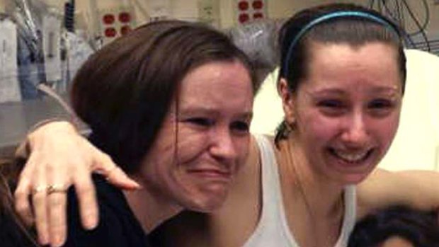 Together again: Amanda Berry, right, with her sister Beth Serrano after being reunited. A source said:  "There is a reason why you have only seen a picture of Amanda", referring to the condition of DeJesus and Knight.
