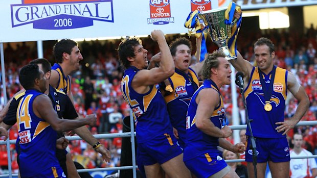 Ben Cousins celebrates with his West Coast 2006 premiership teammates.