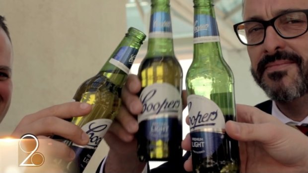 The video is laced with lingering shots of Coopers beers.