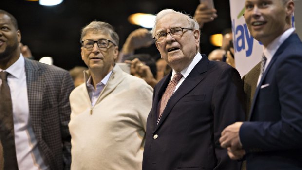 Warren Buffett, chairman and chief executive officer of Berkshire Hathaway and Bill Gates, billionaire and co-founder of the Bill and Melinda Gates Foundation, attend the Berkshire Hathaway annual meeting.