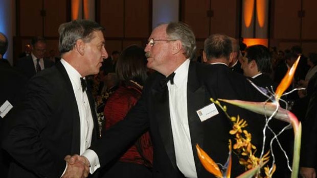 Mitch Hooke (left), the chief executive of the Minerals Council of Australia, speaks with Sir Rod Eddington, a director of mining firm, Rio Tinto, at the dinner.