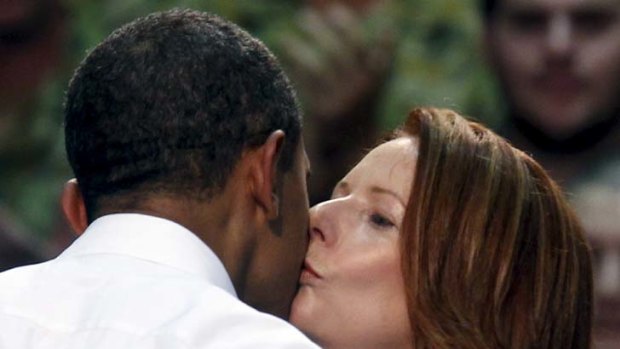 Julia Gillard said she would " catch up" with President Obama during the NATO summit in Chicago.
