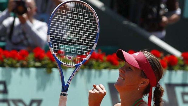 Anastasia Pavlyuchenkova reacts after defeating Vera Zvonareva to enter the quarter-finals.