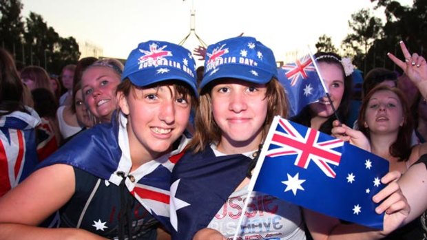Kelsey and Ebony White soak up the atmosphere at last night's Australia Day concert in Canberra.