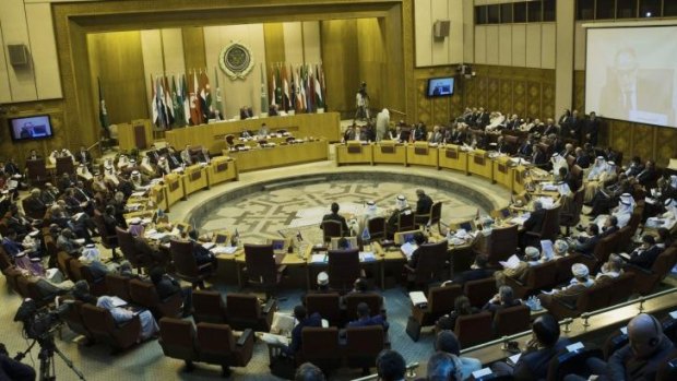 Foreign ministers take their seats at the Arab League headquarters in Cairo on Sunday. 