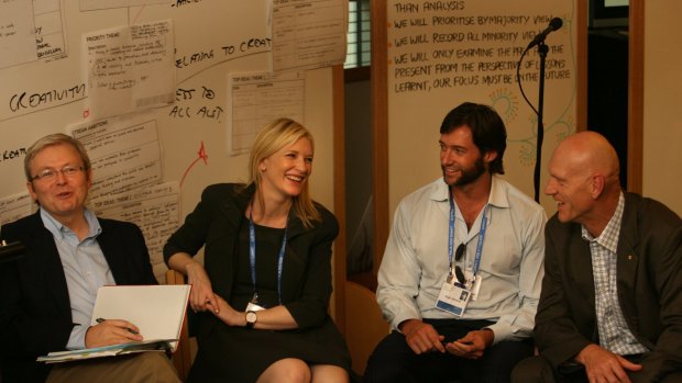 Kevin Rudd, Cate Blanchett, Hugh Jackman and Peter Garrett chatting at the 2020 summit in 2008.