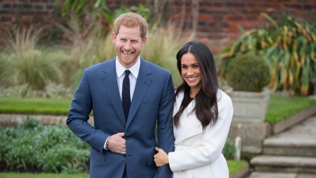 Prince Harry and Meghan Markle after they announced their engagement. The pair are yet to send out invitations.